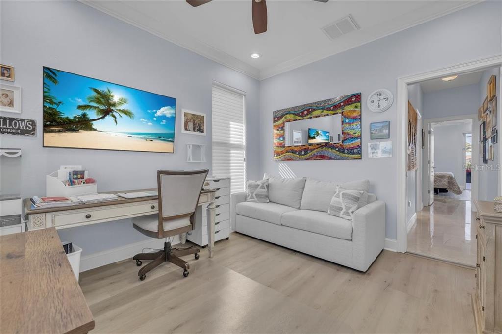 2172 Deborah Drive Punta Gorda, FL 33950 - Photo 25 of 61 a living room with furniture and a flat screen tv