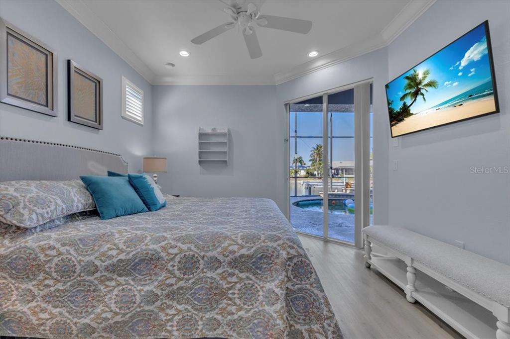 2172 Deborah Drive Punta Gorda, FL 33950 - Photo 28 of 61 a bedroom with a large bed and a couch