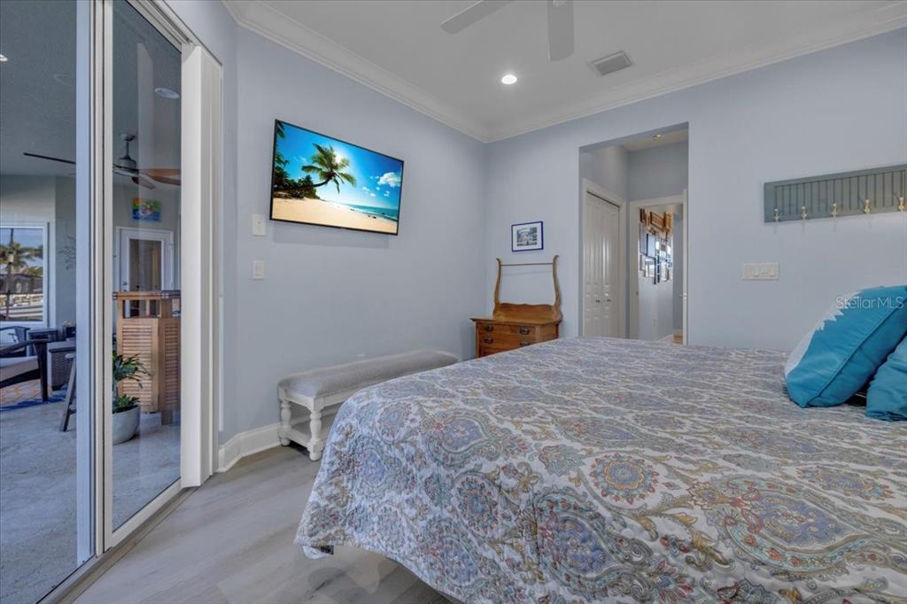 2172 Deborah Drive Punta Gorda, FL 33950 - Photo 29 of 61 a bedroom with a bed and a painting