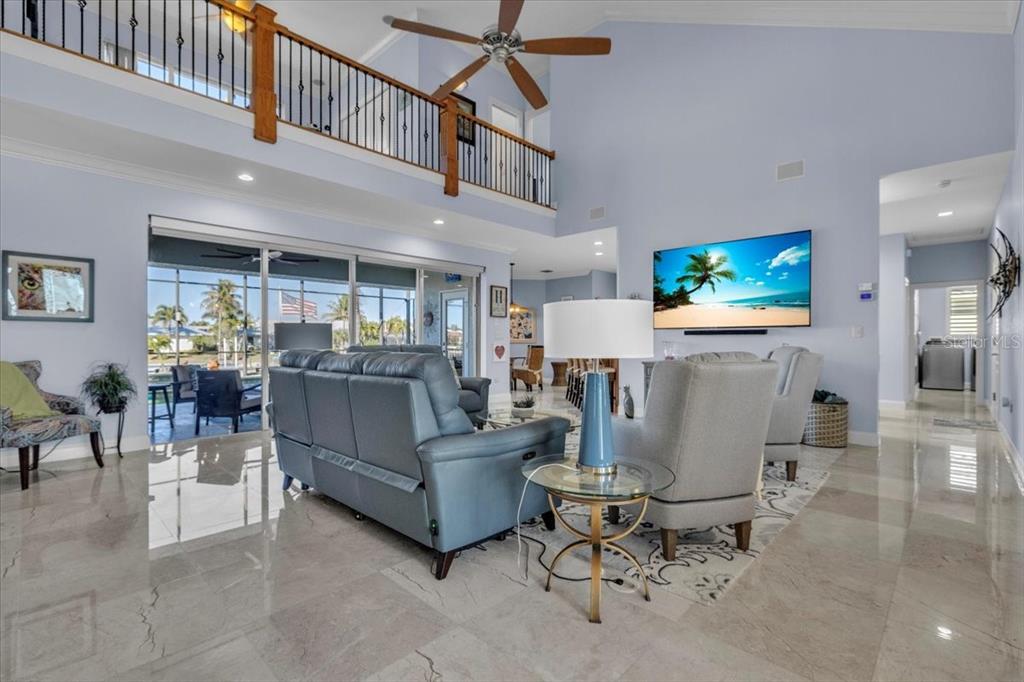 2172 Deborah Drive Punta Gorda, FL 33950 - Photo 5 of 61 a living room with furniture and a flat screen tv