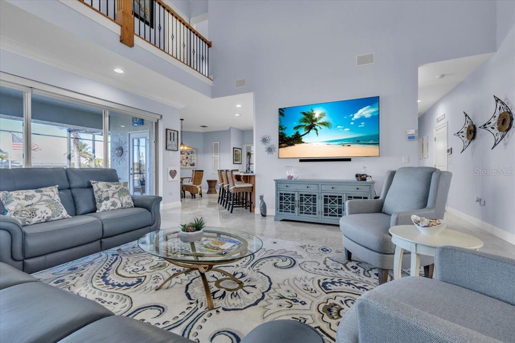 2172 Deborah Drive Punta Gorda, FL 33950 - Photo 8 of 61 a living room with furniture and a flat screen tv