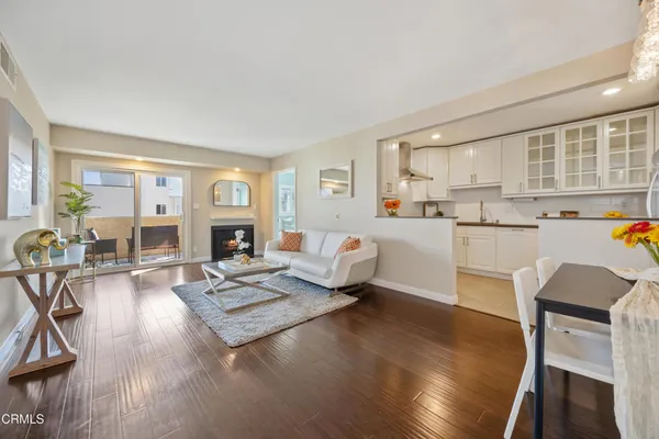 a living room with furniture and a table