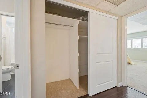 a view of a bathroom from a hallway