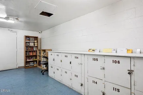a view of an empty room with closet