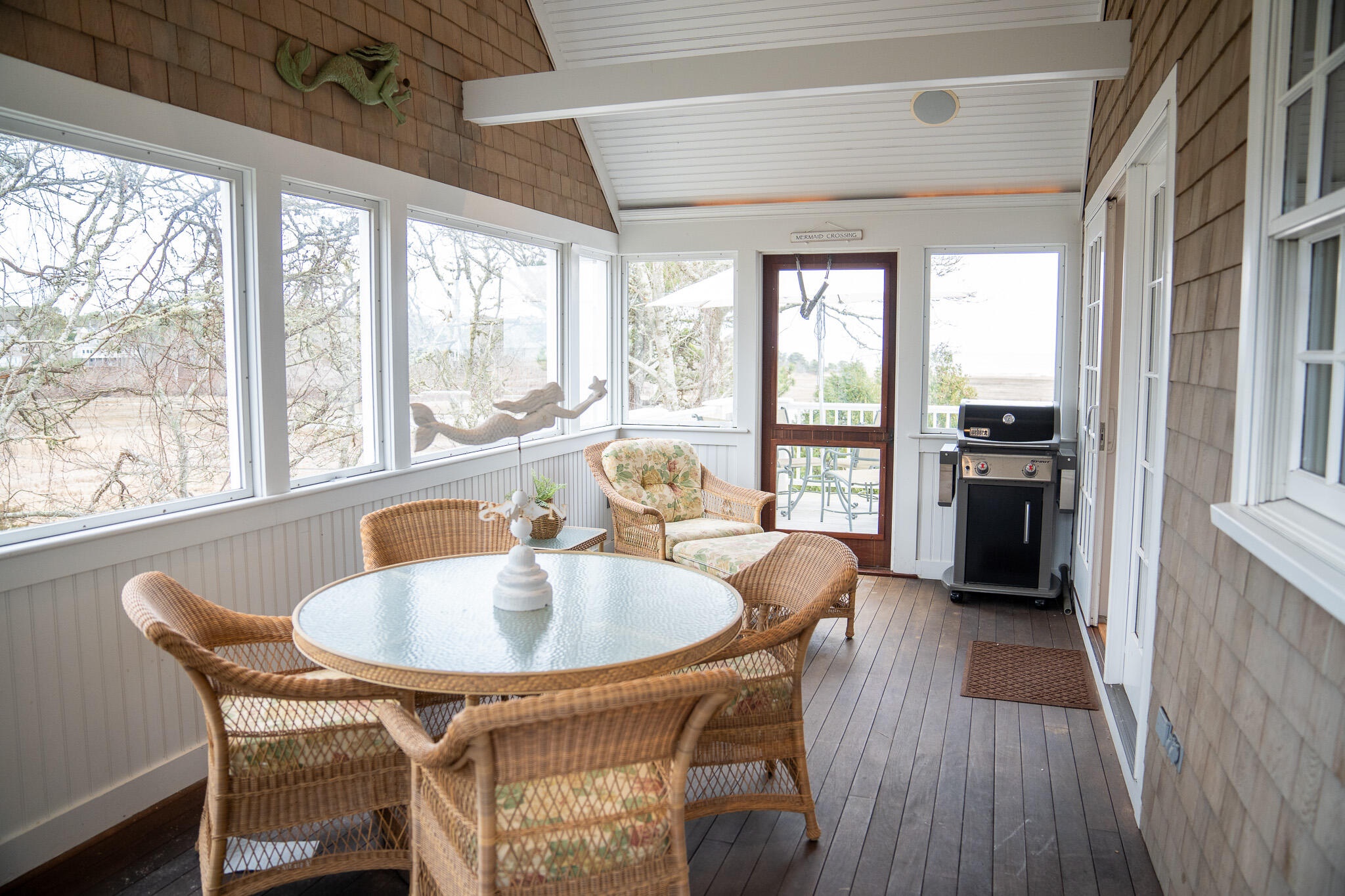 48 South Chatham Road Harwich, MA 02645 - Photo 18 of 54 a dining room with furniture large windows a chandelier