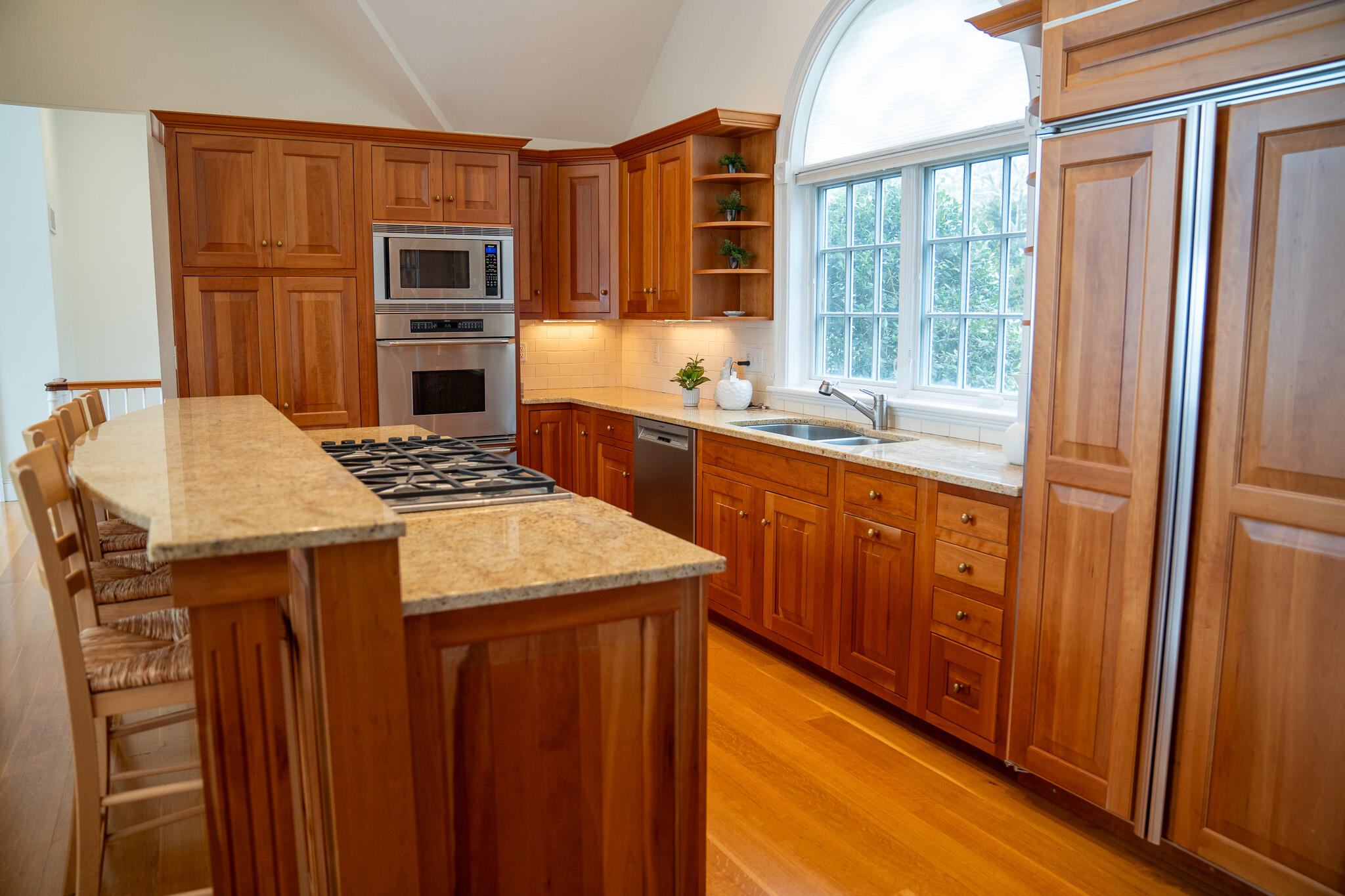 48 South Chatham Road Harwich, MA 02645 - Photo 24 of 54 a kitchen with stainless steel appliances granite countertop a sink stove and refrigerator