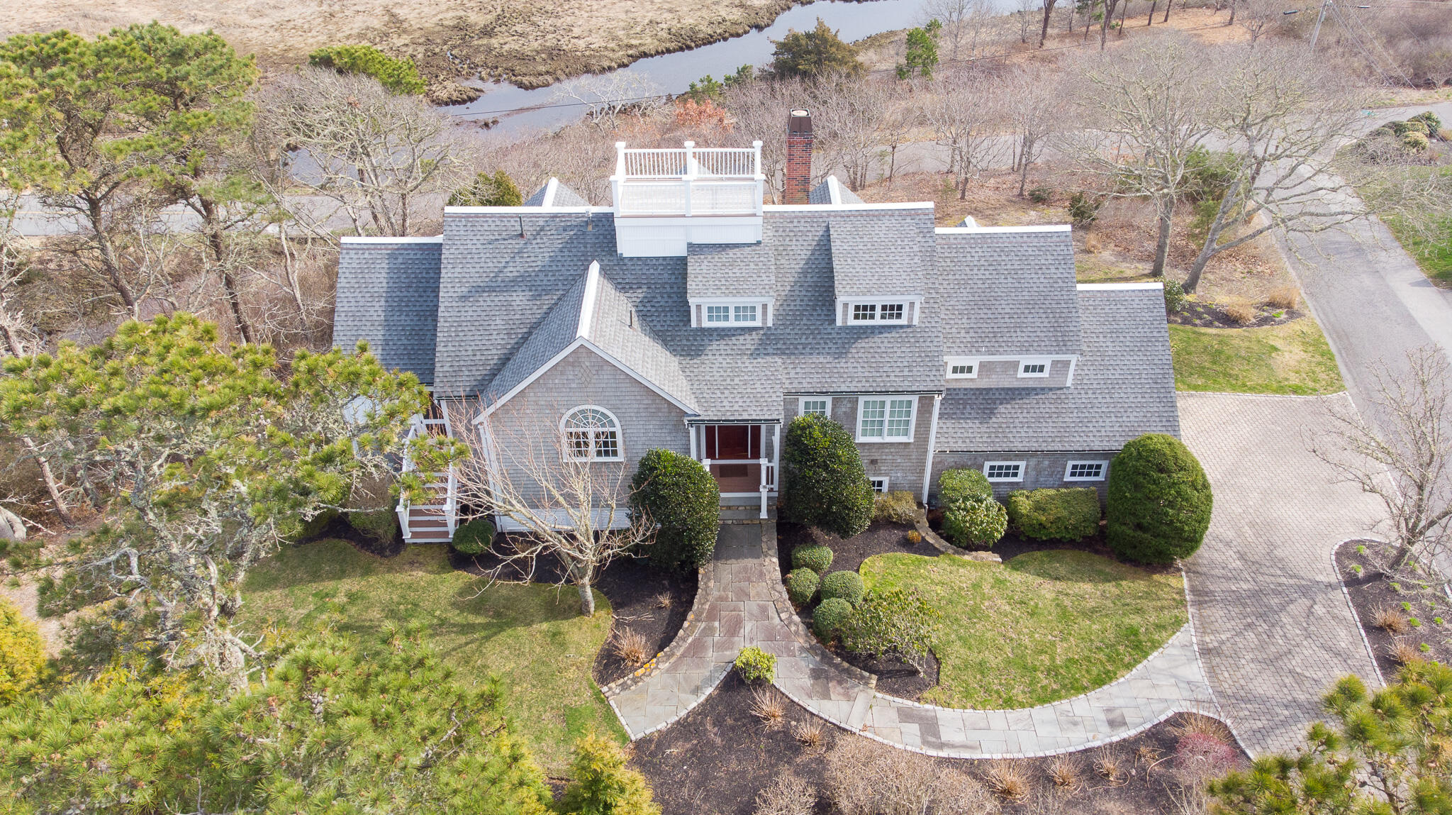 48 South Chatham Road Harwich, MA 02645 - Photo 3 of 54 front view of a house with a yard
