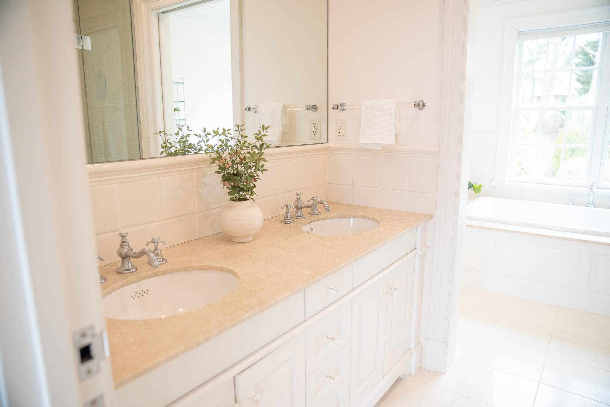 48 South Chatham Road Harwich, MA 02645 - Photo 35 of 54 a bathroom with a granite countertop sink and a mirror