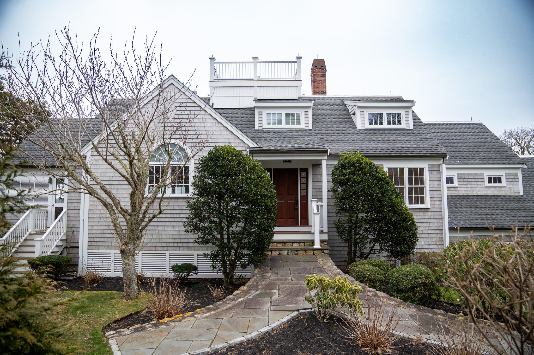 48 South Chatham Road Harwich, MA 02645 - Photo 4 of 54 a front view of a house with garden