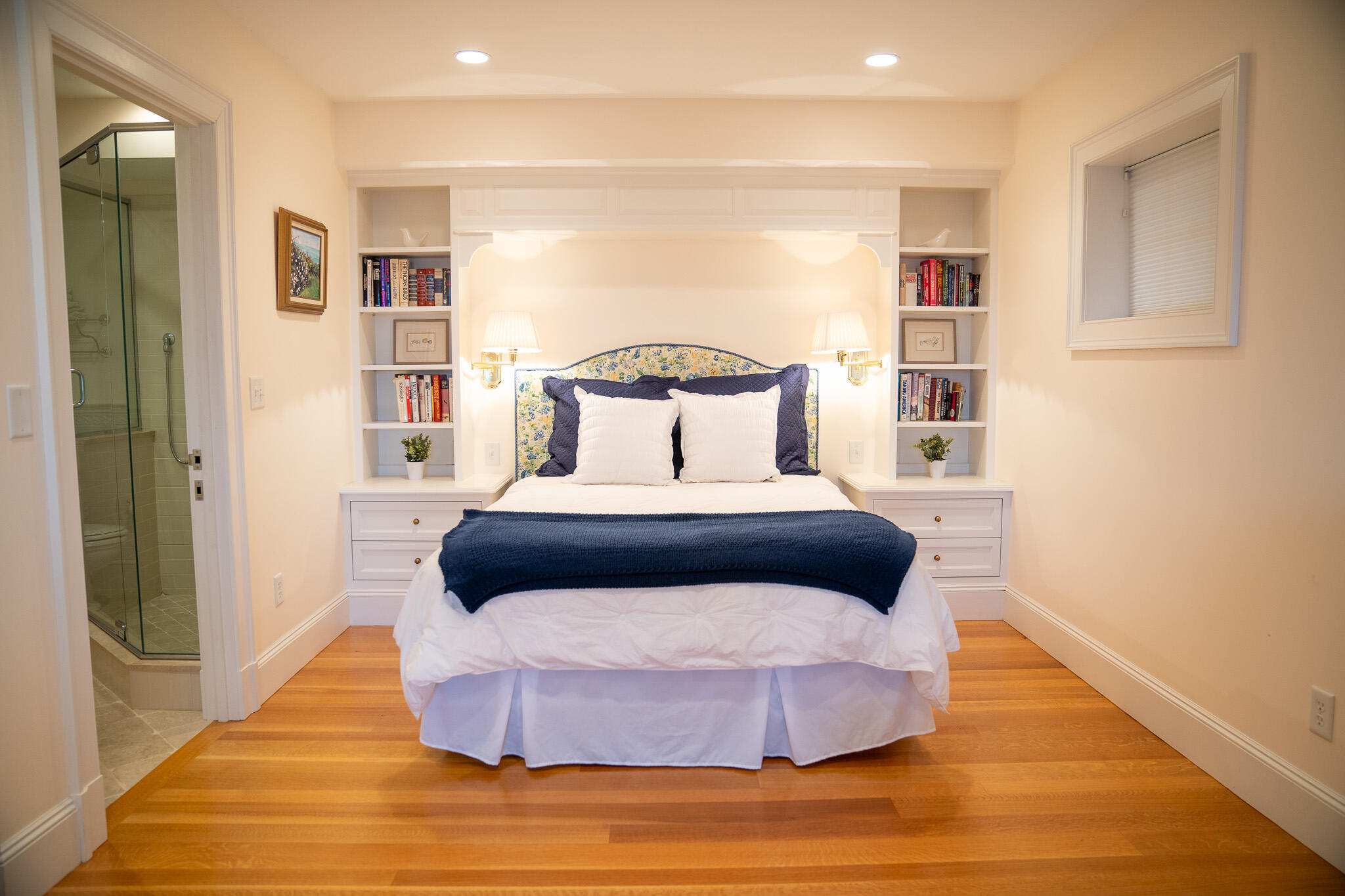 48 South Chatham Road Harwich, MA 02645 - Photo 50 of 54 a bedroom with a bed and a wooden floor