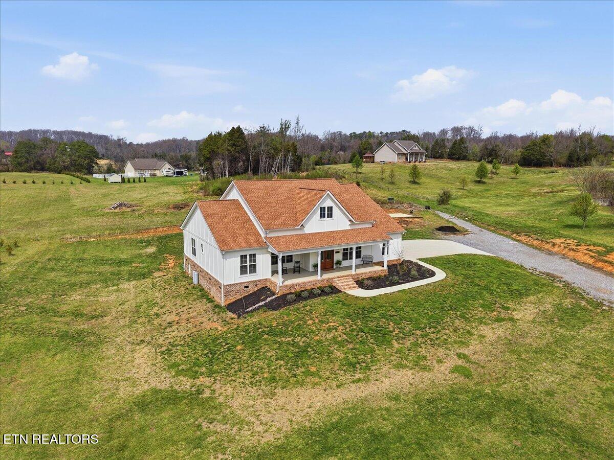 4817 Morganton Road Greenback, TN 37742 - Photo 4 of 41 42-007_dji_fly_20260320_134632_0069_1774