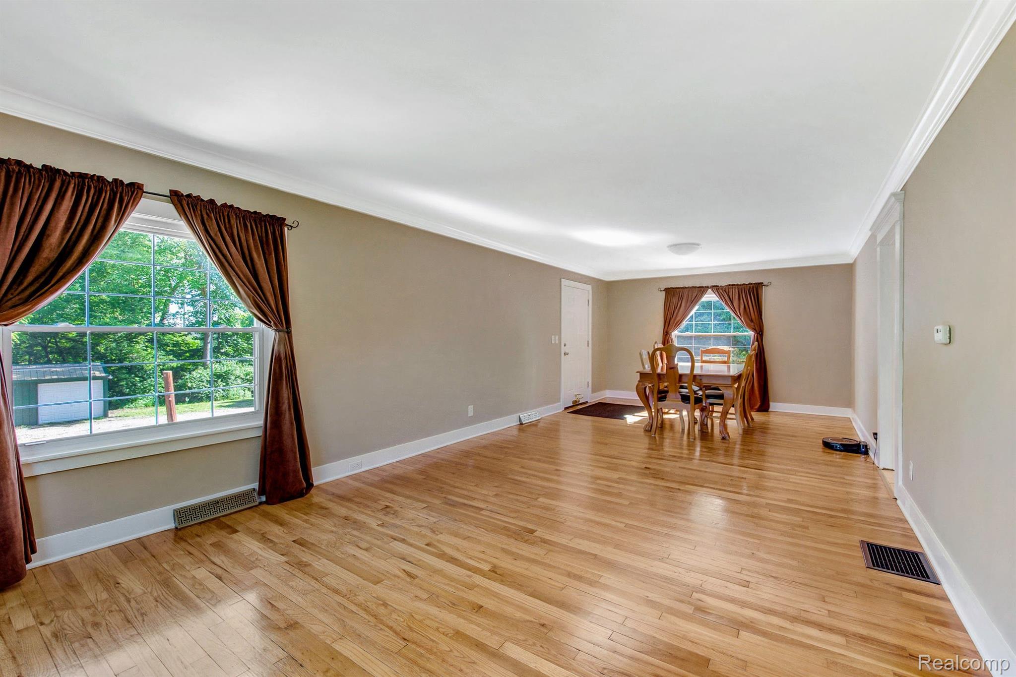 5102 South Lapeer Road Metamora, MI 48455 - Photo 14 of 42 Spacious Living room dining area combo.