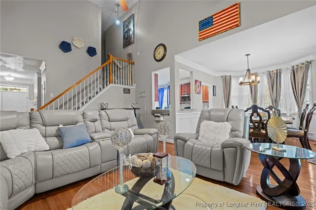 a living room with furniture and a couch