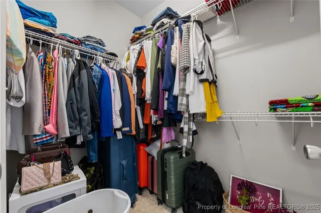 a bathroom with a tub and a shower