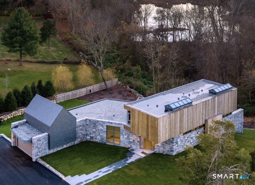 314 Ferry Road Old Lyme, CT 06371 - Photo 33 of 40 From its modest yet striking facade to its stunning 35-foot rear exposure. Greystone takes full advantage of its site's topography and orientations.