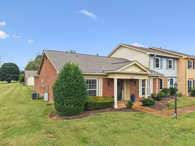 a view of a house with a garden