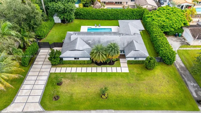 a view of an outdoor space pool patio and outdoor seating