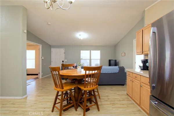 a kitchen with sink a stove and cabinets