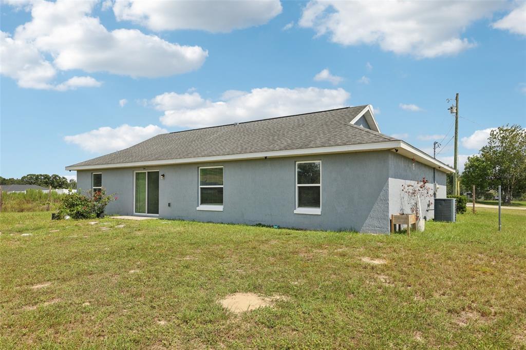5 Laurel Pass Court Ocala, FL 34480 - Photo 21 of 23 a house that has a big yard