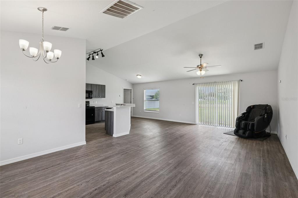 5 Laurel Pass Court Ocala, FL 34480 - Photo 6 of 23 a living room with furniture and wooden floor