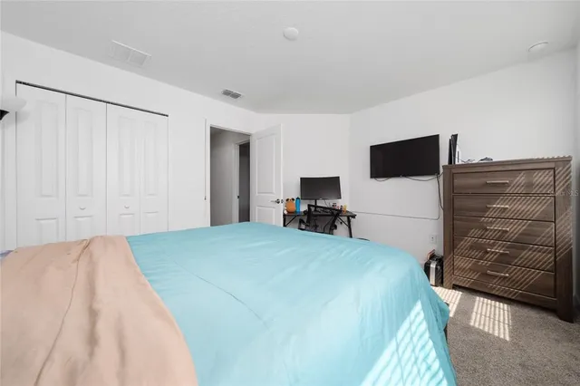 a view of storage and utility room with stairs