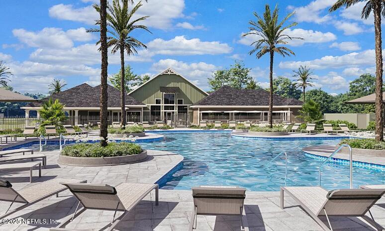 3199 Tupelo Loop Green Cove Springs, FL 32043 - Photo 10 of 26 a front view of a house with swimming pool having outdoor seating