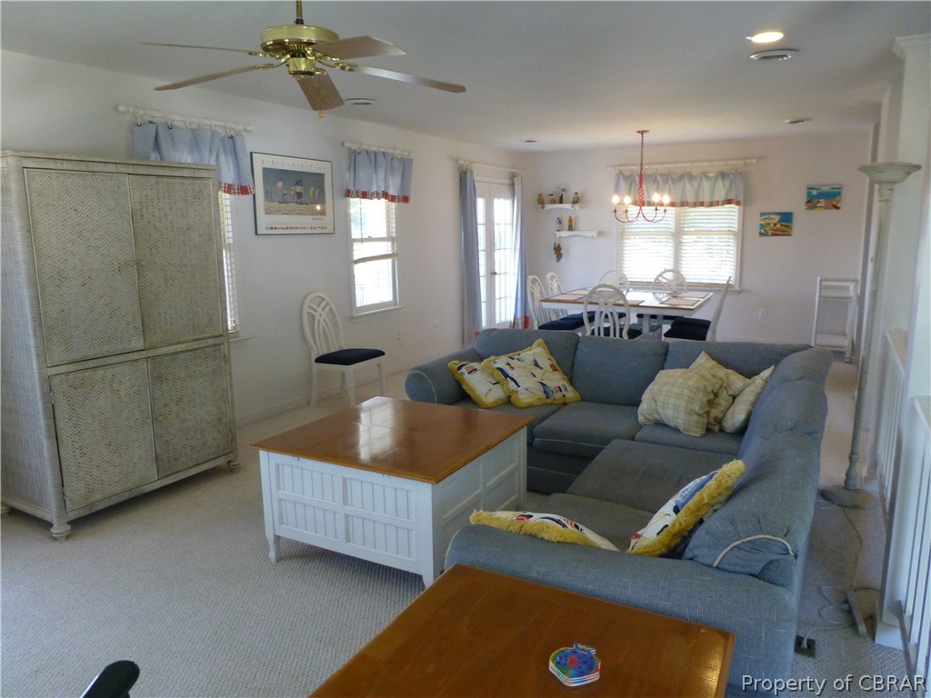 464 Jackson Creek Road Deltaville, VA 23043 - Photo 3 of 26 Great room - living room and dining room open onto huge screen porch via French Doors!