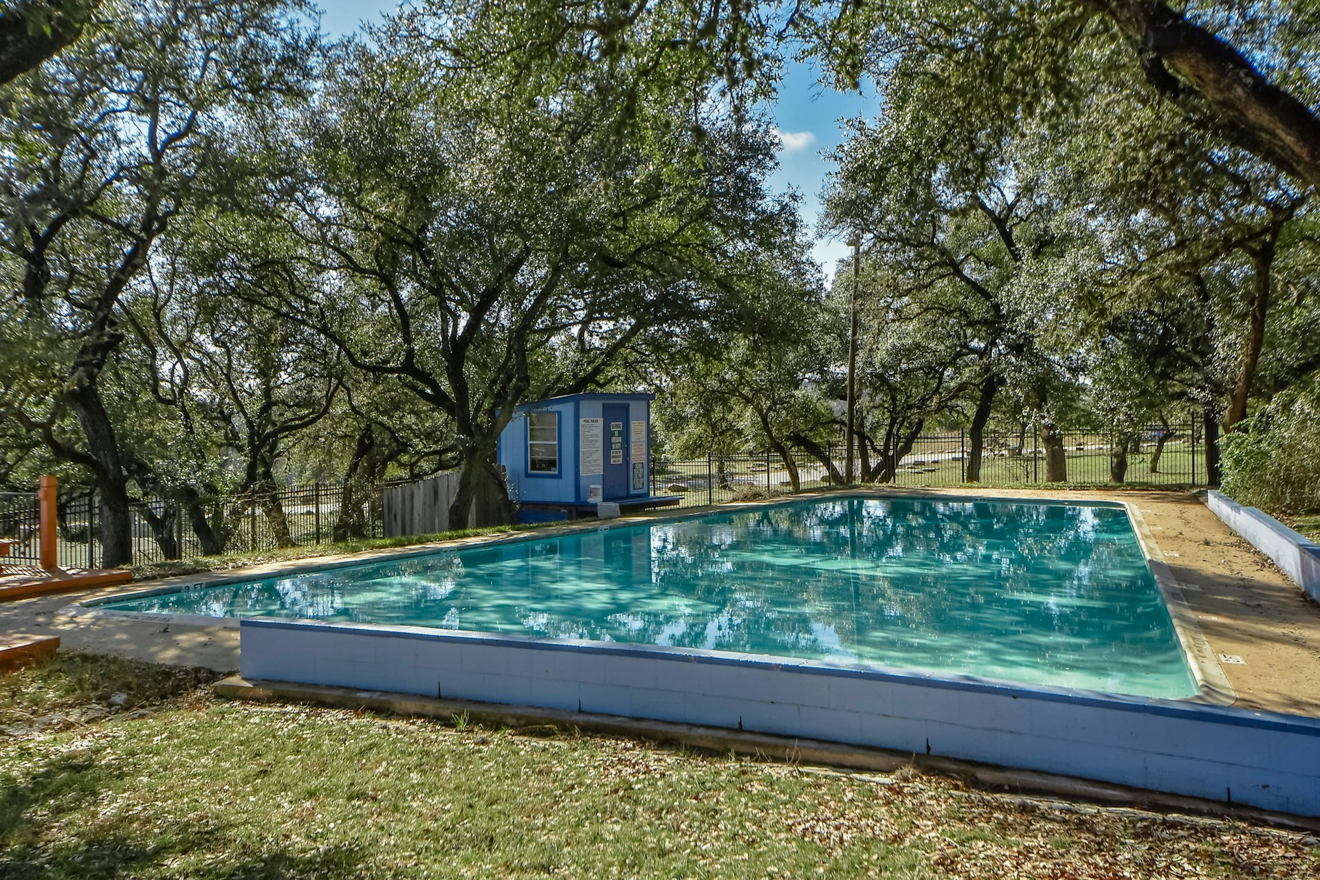 14922 Running Deer Trail Austin, TX 78734 - Photo 8 of 31 View of swimming pool featuring an outdoor structure, fence, and a fenced in pool