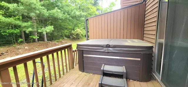 a view of balcony with furniture