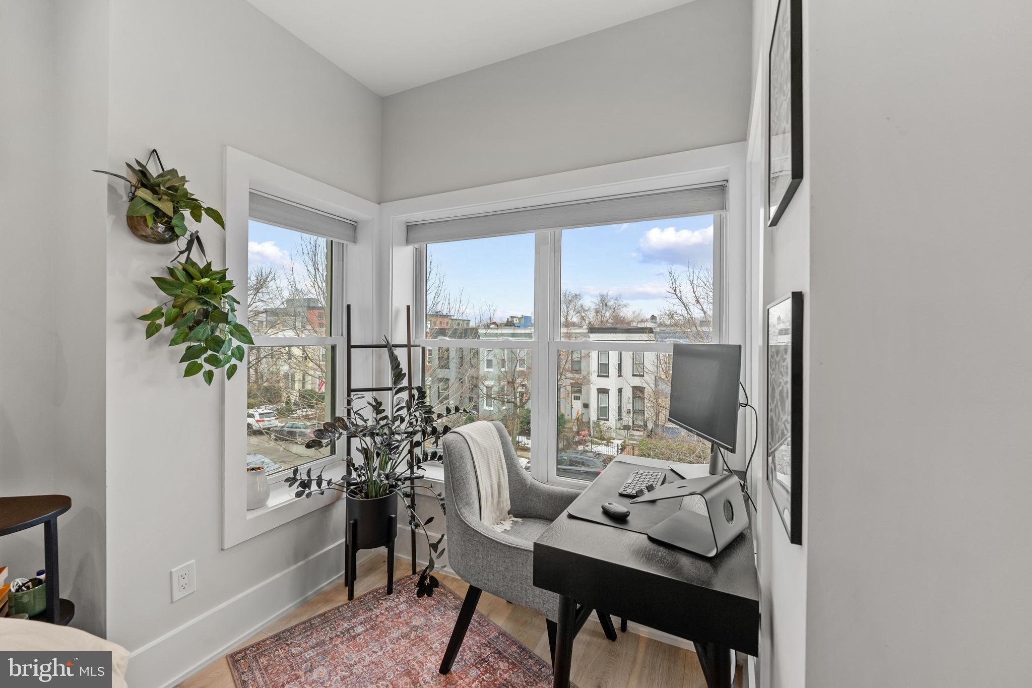 1216 I Street Northeast, Unit A Washington, DC 20002 - Photo 14 of 34 a view of a dining room with furniture window and outside view
