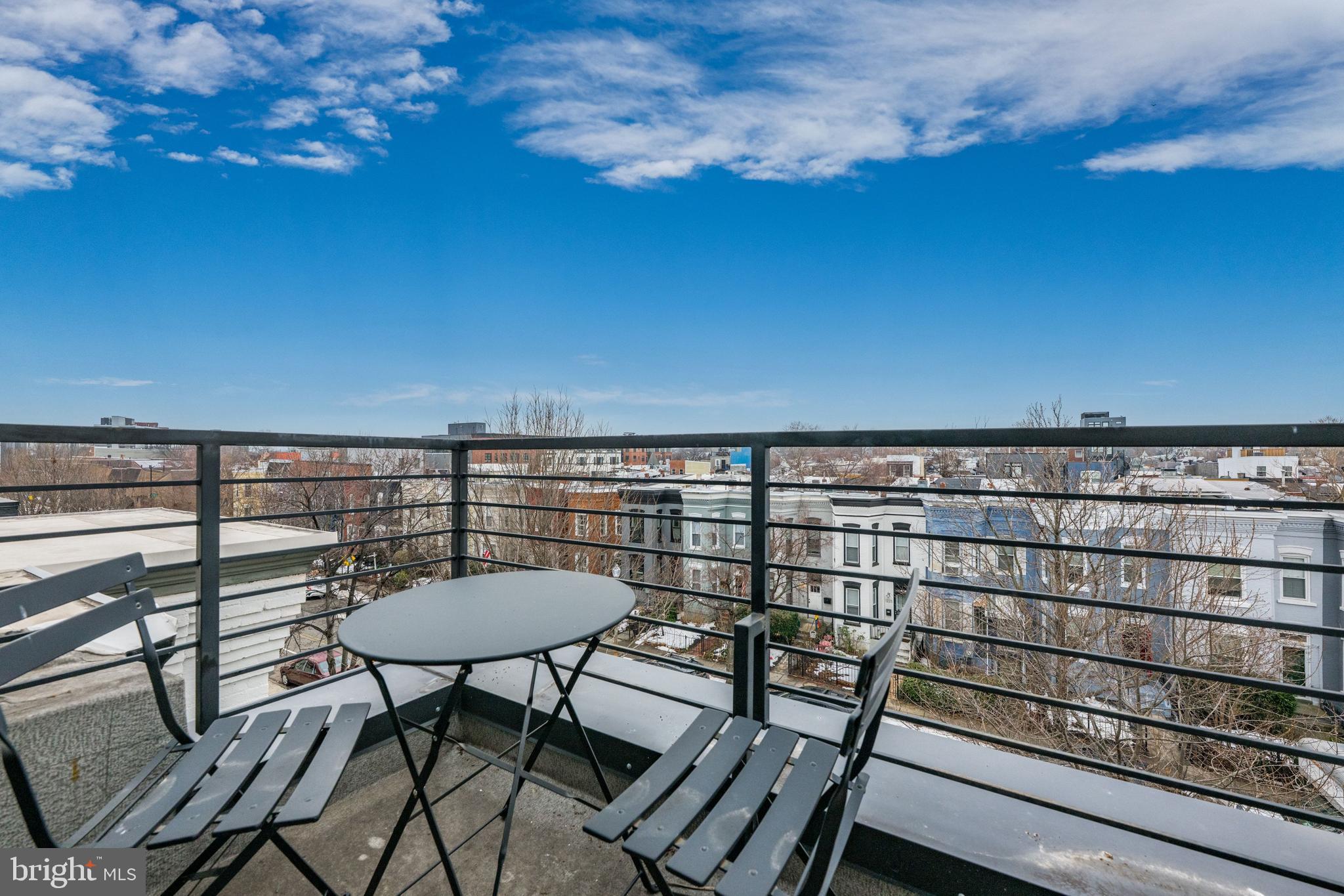 1216 I Street Northeast, Unit A Washington, DC 20002 - Photo 20 of 34 a view of a chairs and table on the terrace