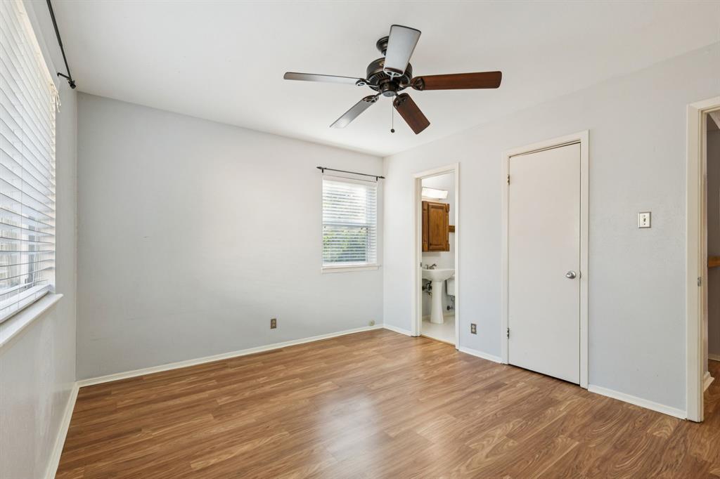 1602 England Road Arlington, TX 76013 - Photo 15 of 27 a view of empty room with wooden floor and ceiling fan