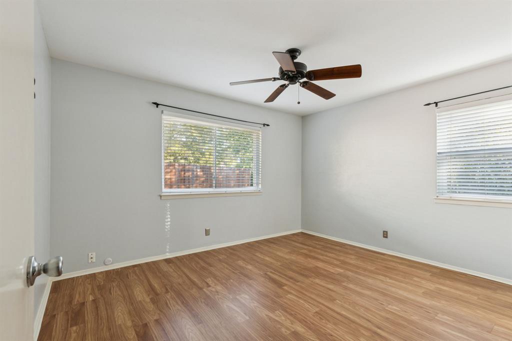 1602 England Road Arlington, TX 76013 - Photo 17 of 27 a view of empty room with wooden floor and fan