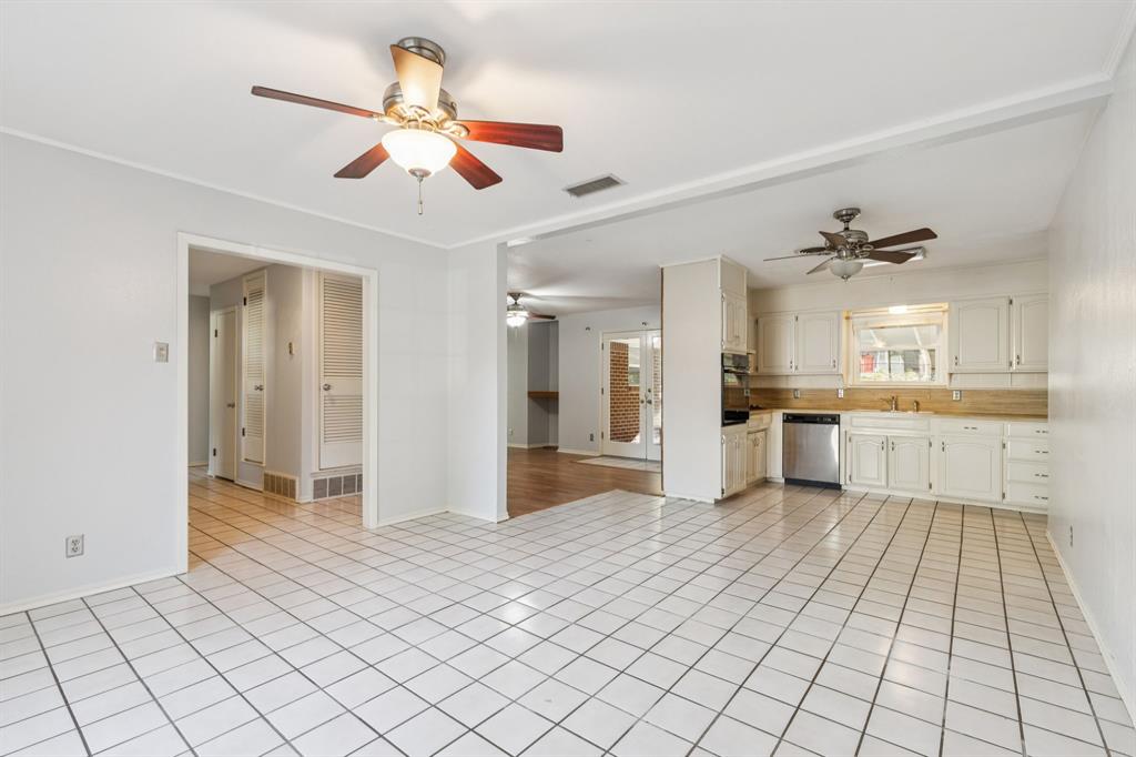 1602 England Road Arlington, TX 76013 - Photo 3 of 27 a large white kitchen with a sink and dish washer