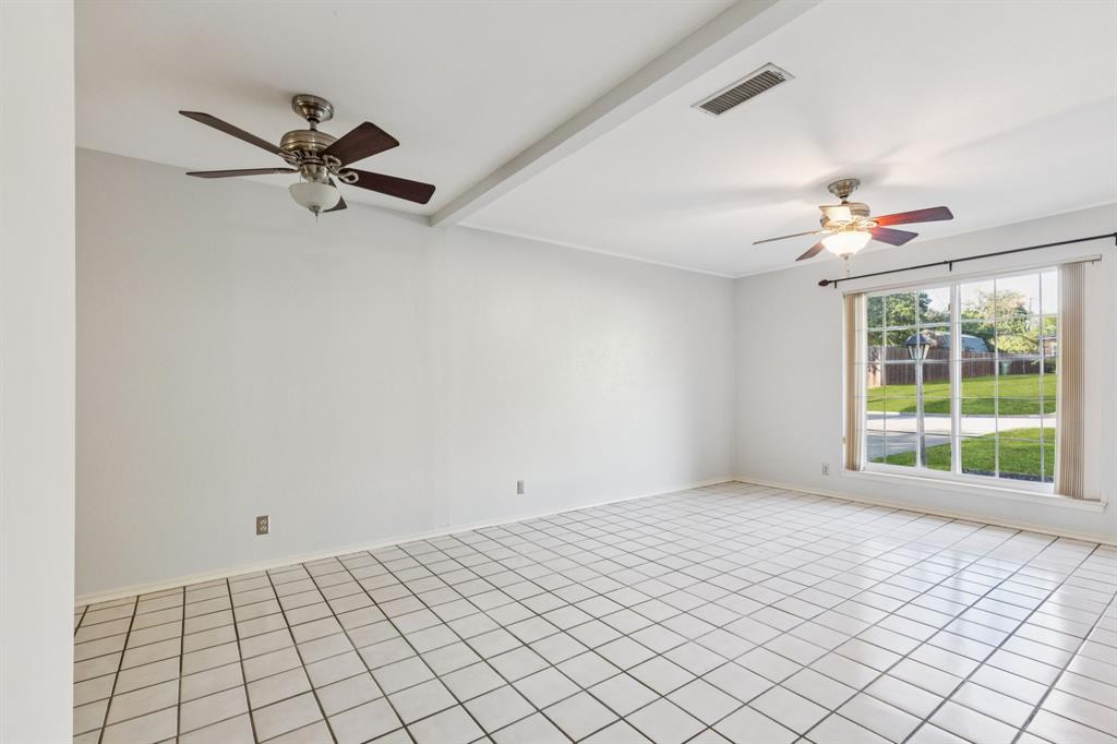 1602 England Road Arlington, TX 76013 - Photo 4 of 27 a view of an empty room with a window