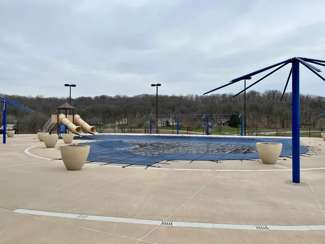 a view of swimming pool with a patio