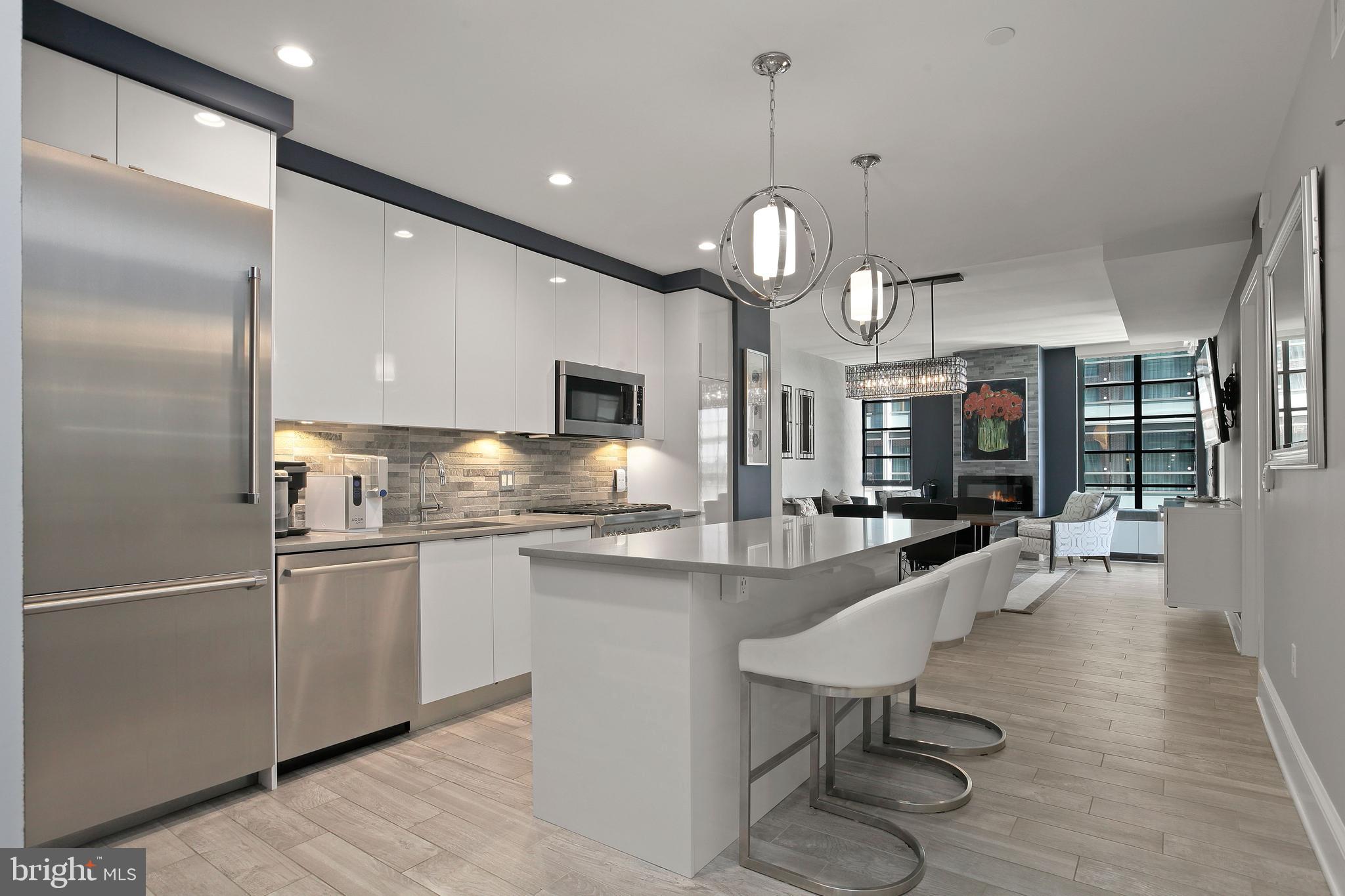 45 Sutton Square Southwest, Unit 604 Washington, DC 20024 - Photo 42 of 42 Open floor plan with high end kitchen