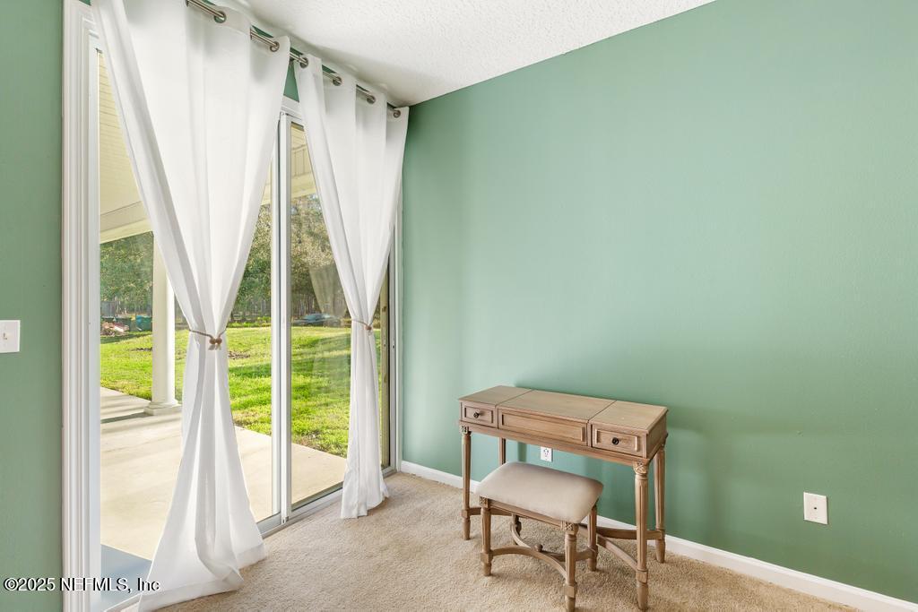 55016 Bear Run Road Callahan, FL 32011 - Photo 50 of 74 a view of a room with furniture and a window