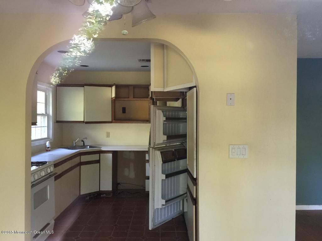 182 Peskin Road Farmingdale, NJ 07727 - Photo 6 of 7 KITCHEN AND DINING ROOM THROUGH WINDOW