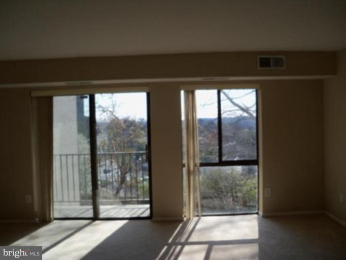 6149 Edsall Road, Unit E Alexandria, VA 22304 - Photo 3 of 24 a view of a glass door