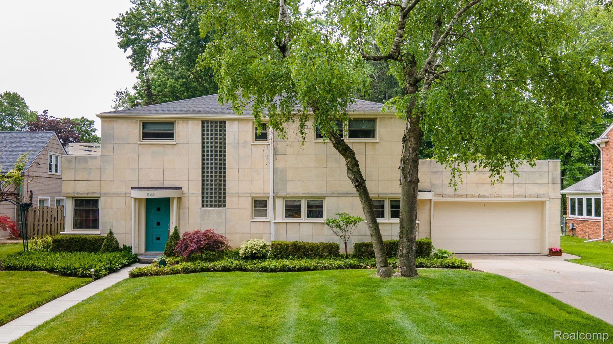 641 South Oxford Road Grosse Pointe, MI 48236 - Photo 2 of 57 Light-colored sandstone and glass block windows