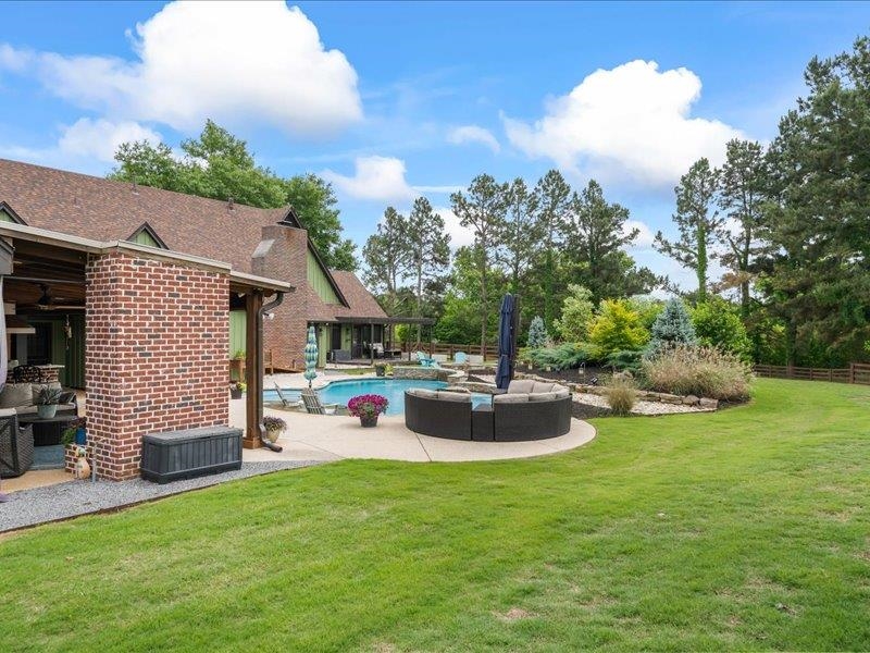 8104 Jack Bond Road Arlington, TN 38002 - Photo 35 of 40 a view of a house with backyard and sitting area
