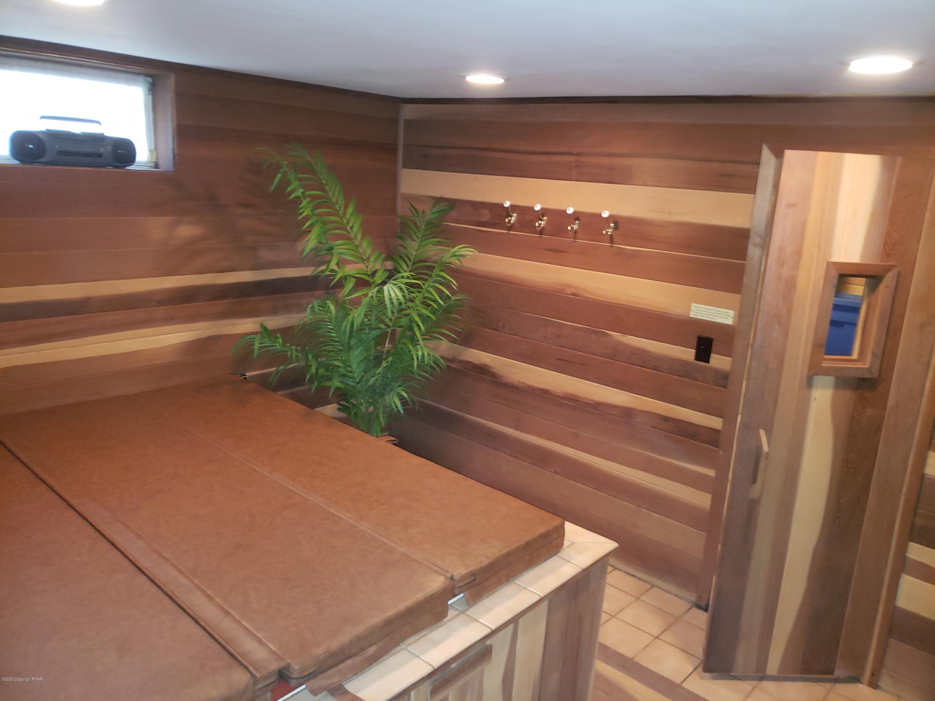 1437 Clover Road Long Pond, PA 18334 - Photo 21 of 38 a room with trees in it
