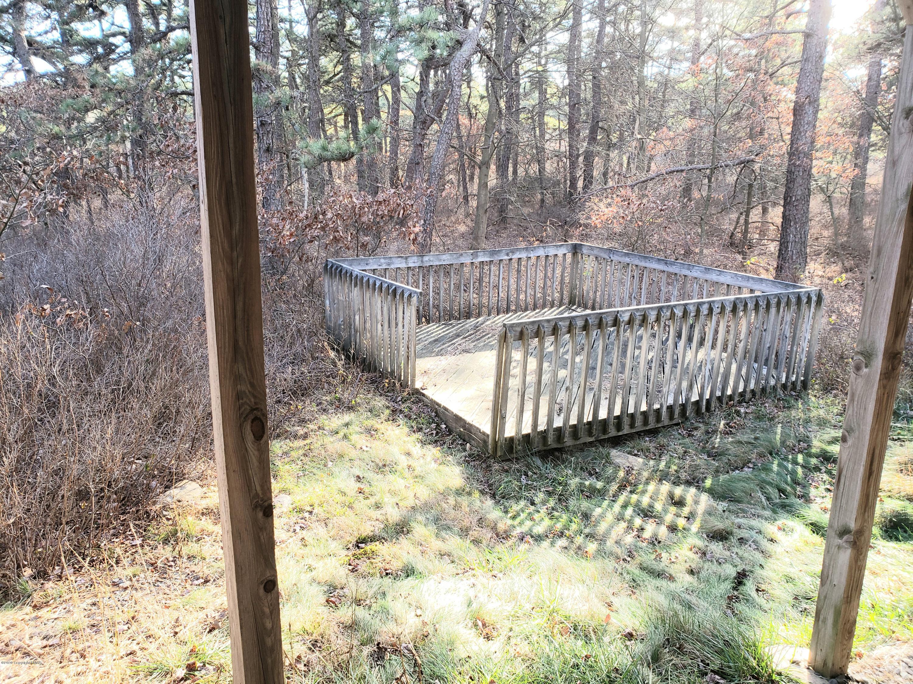 1437 Clover Road Long Pond, PA 18334 - Photo 30 of 38 a view of a balcony with a tree
