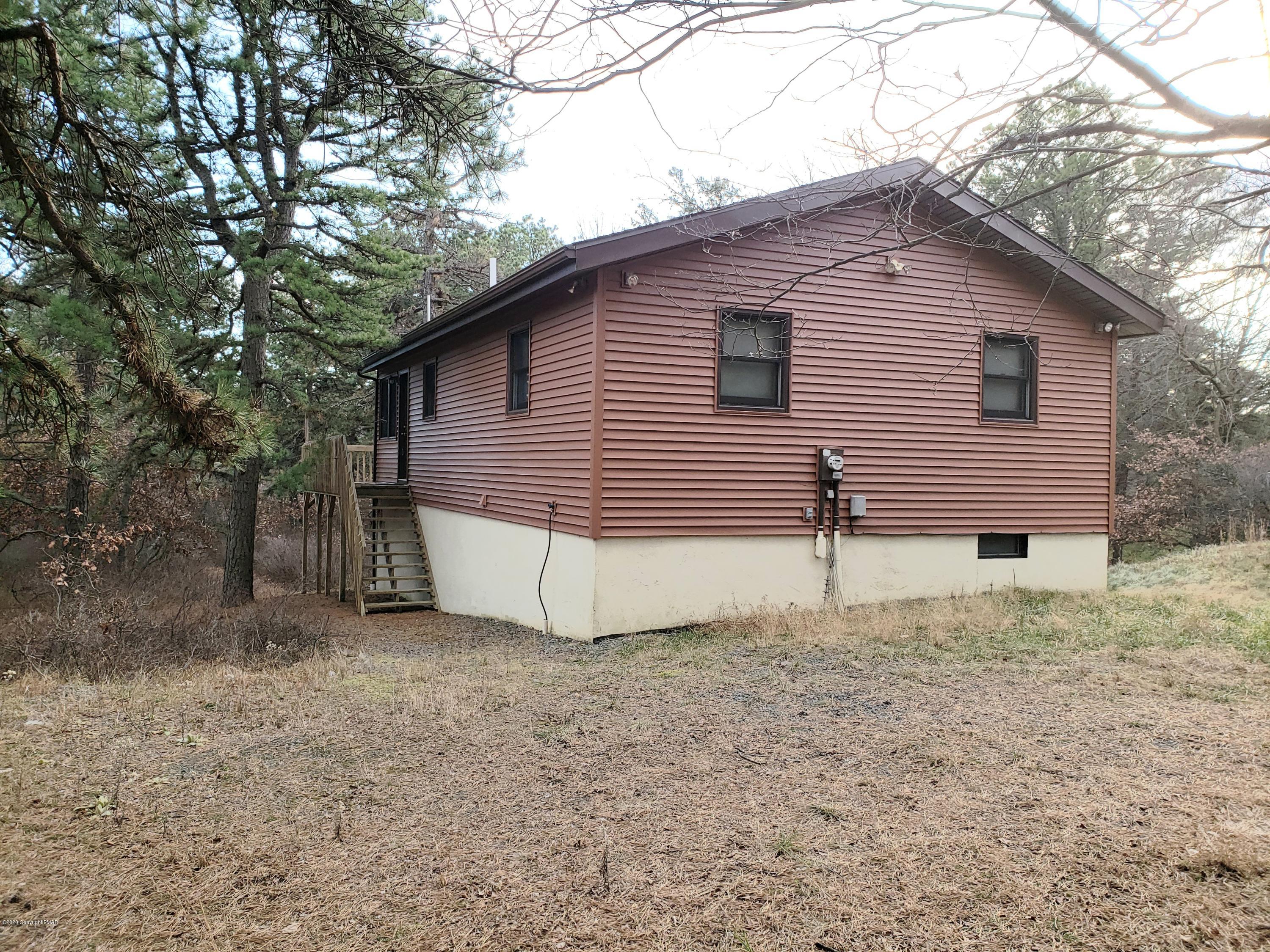 1437 Clover Road Long Pond, PA 18334 - Photo 33 of 38 a view of a house with a yard