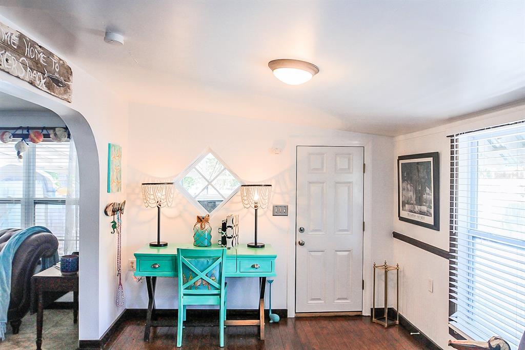 4380 Benview Avenue Weeki Wachee, FL 34607 - Photo 11 of 56 a view of a livingroom with furniture and window