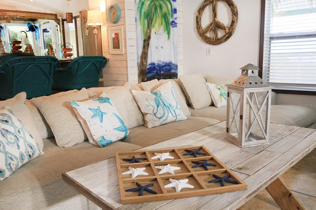 4380 Benview Avenue Weeki Wachee, FL 34607 - Photo 15 of 56 a living room with furniture and wooden floor