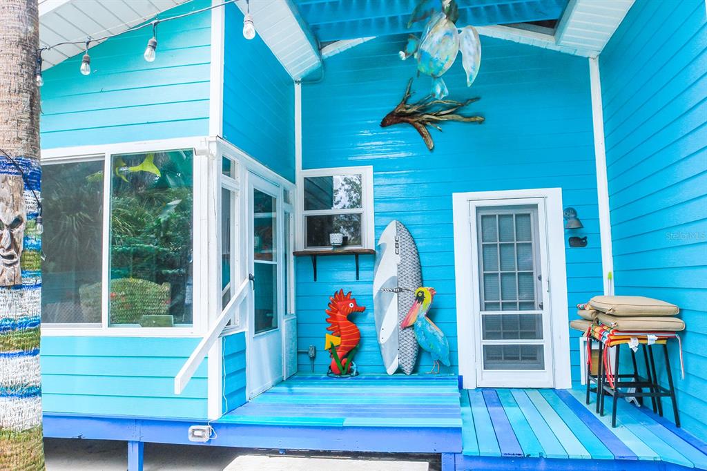 4380 Benview Avenue Weeki Wachee, FL 34607 - Photo 27 of 56 a view of front door with outdoor seating