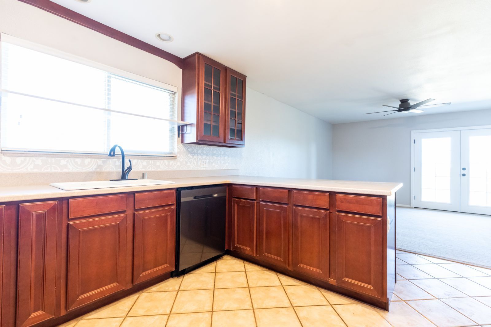 1960 Autumn Avenue Ridgecrest, CA 93555 - Photo 11 of 37 a kitchen with stainless steel appliances granite countertop a sink and cabinets