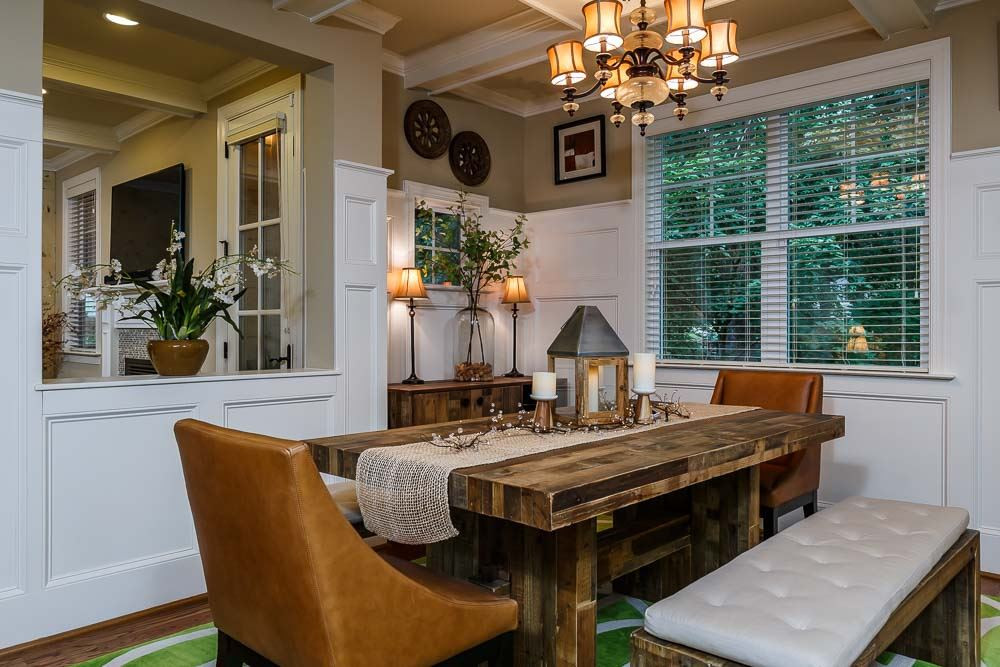 8103 Dreamy Way Raleigh, NC 27613 - Photo 5 of 25 The Dining Room flows naturally into the Gourmet Kitchen Area with the Relaxing Ambience of the crackling Fire right off to the side in the Keeping Area all the while allowing ample seating for all your Guests. Dining Room